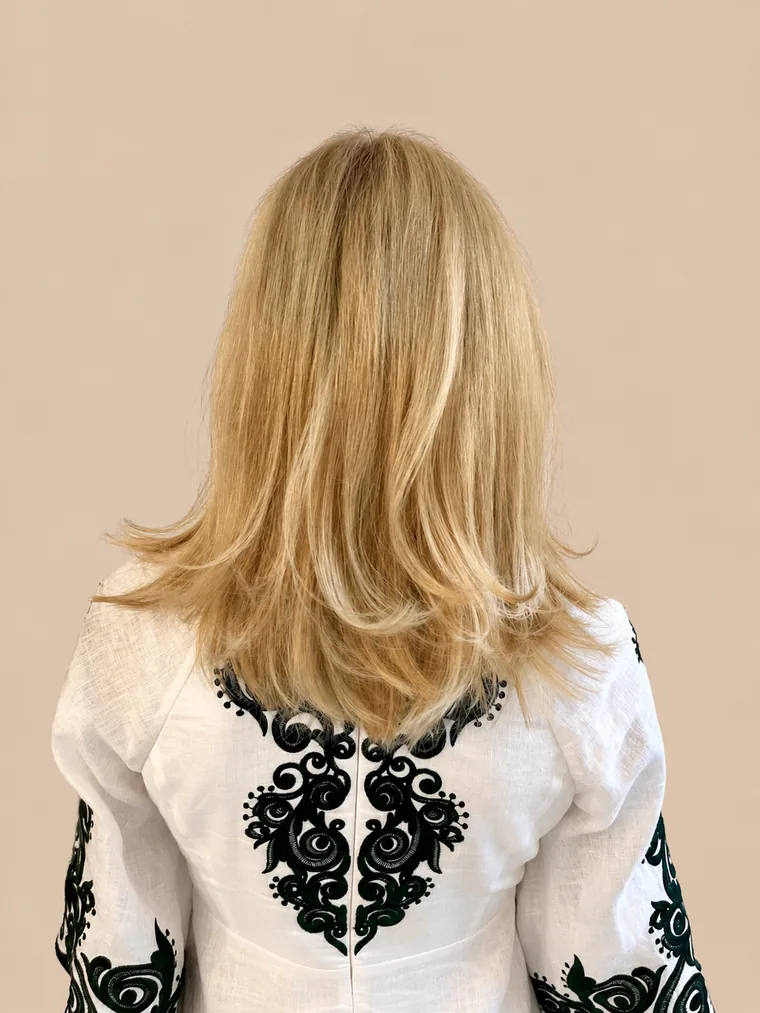 longer, layered blonde hair with more volume